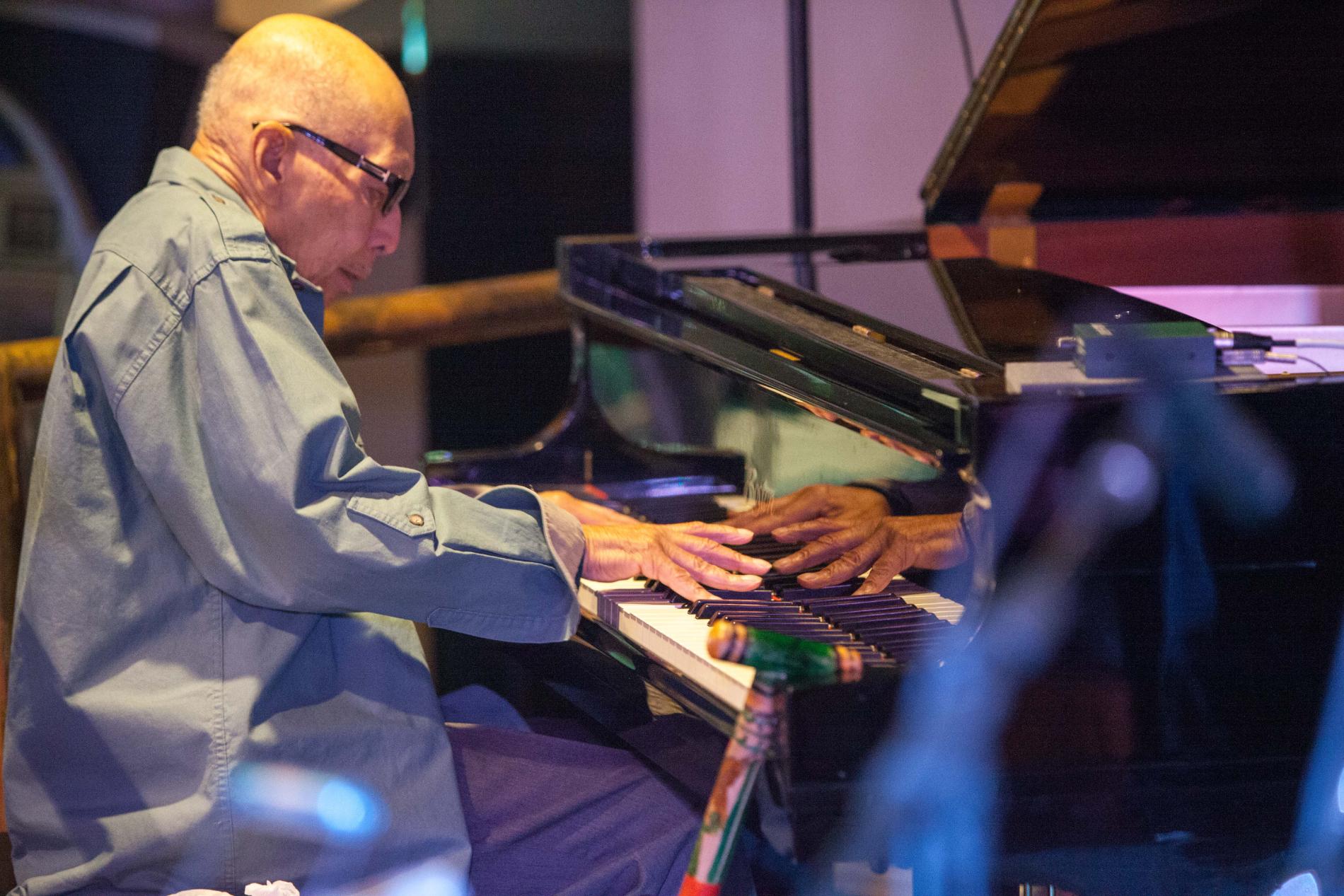 Claude Black at the piano